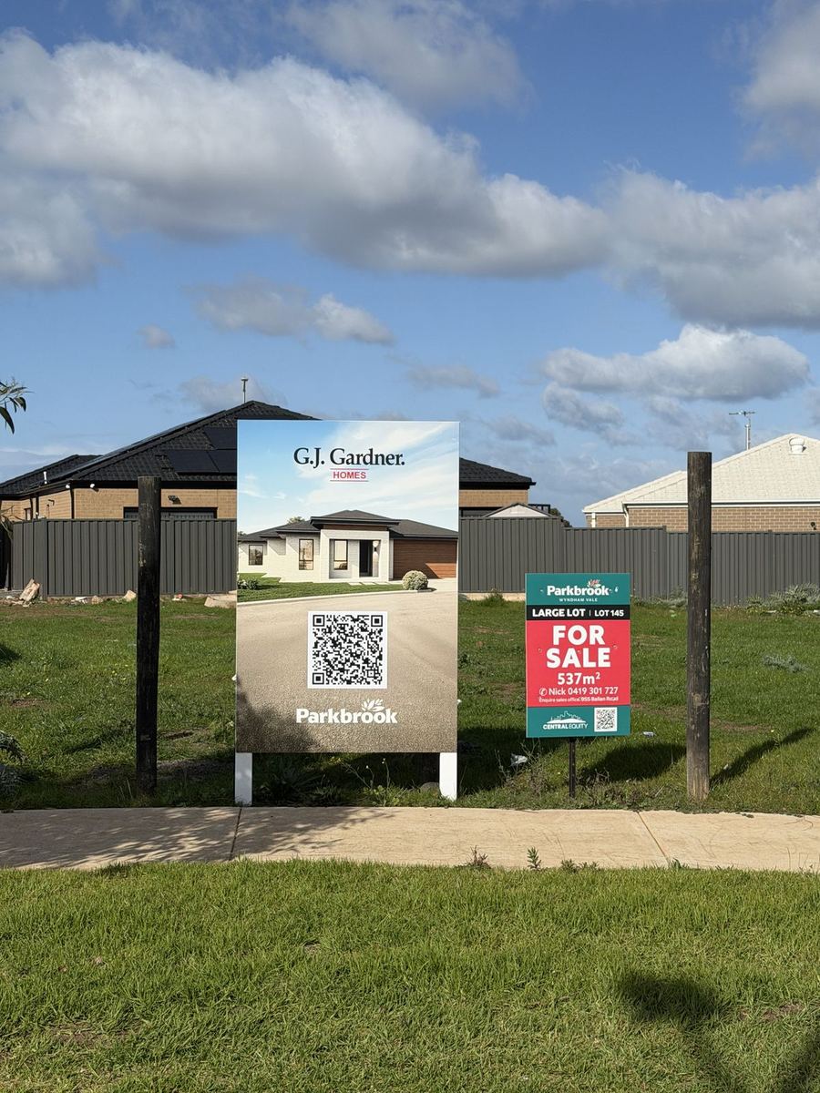 GJ Gardner Homes for-sale board on a vacant block