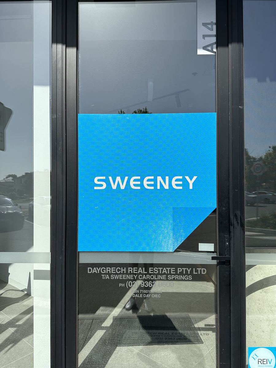Sweeney one-way vision graphic on a glass shopfront