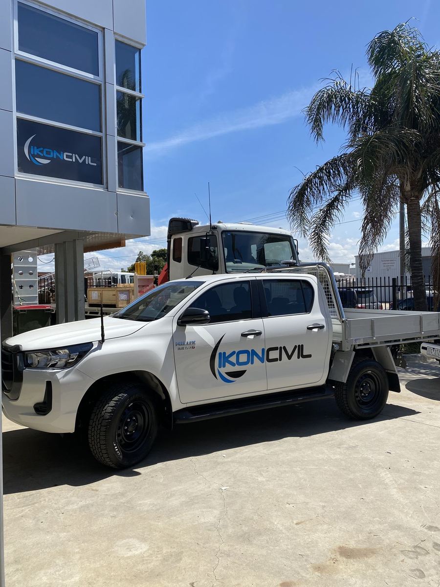 Ikon Civil ute with door logo decals, side view